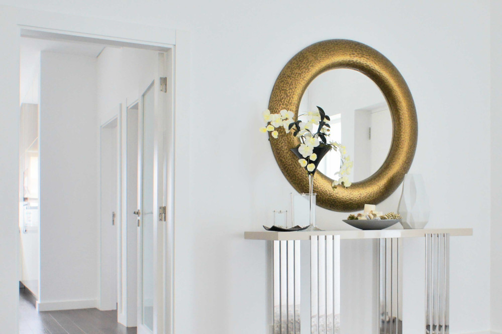 Millenium Round Mirror Finished in Textured Gold