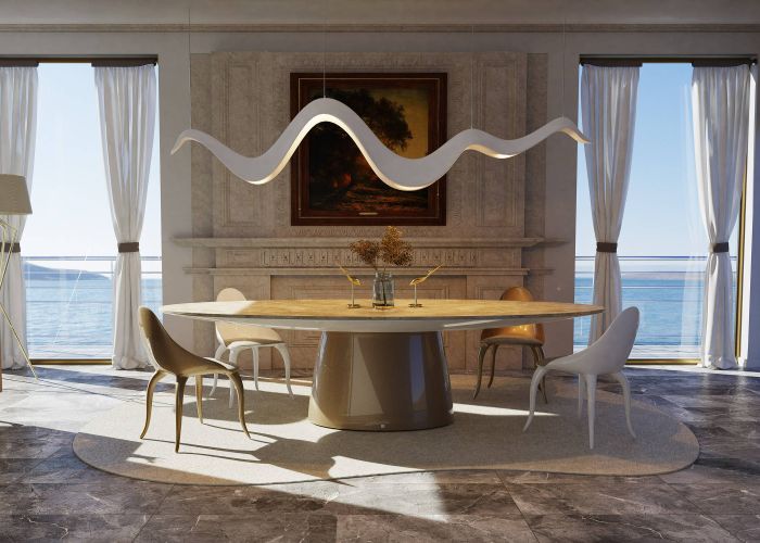 Magna dining table in champagne color and fior di bosco marble top